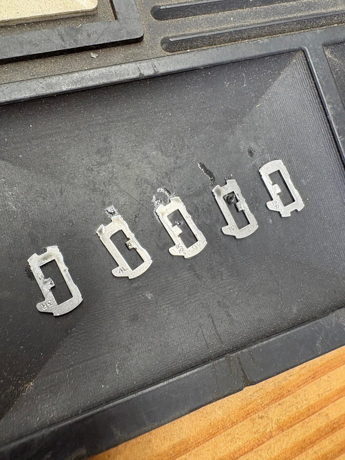 Worn ignition wafers from a 2013 Chevy Camaro repair by Okey Locksmith in Oklahoma City