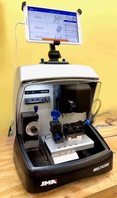 Professional key cutting machine and locksmith equipment at Okey Locksmith Oklahoma City