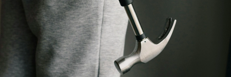 A person holding a hammer