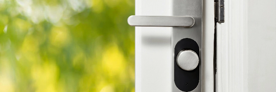 A smart home lock on a while door