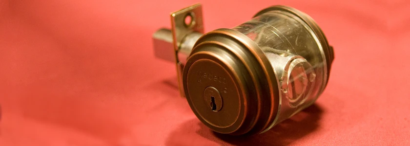 Deadbolt door lock latches