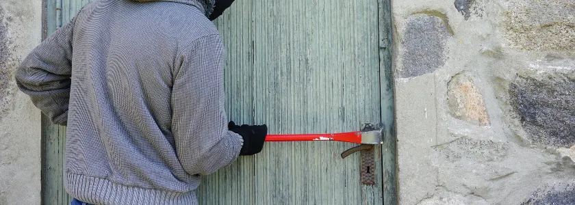 Man breaking into house