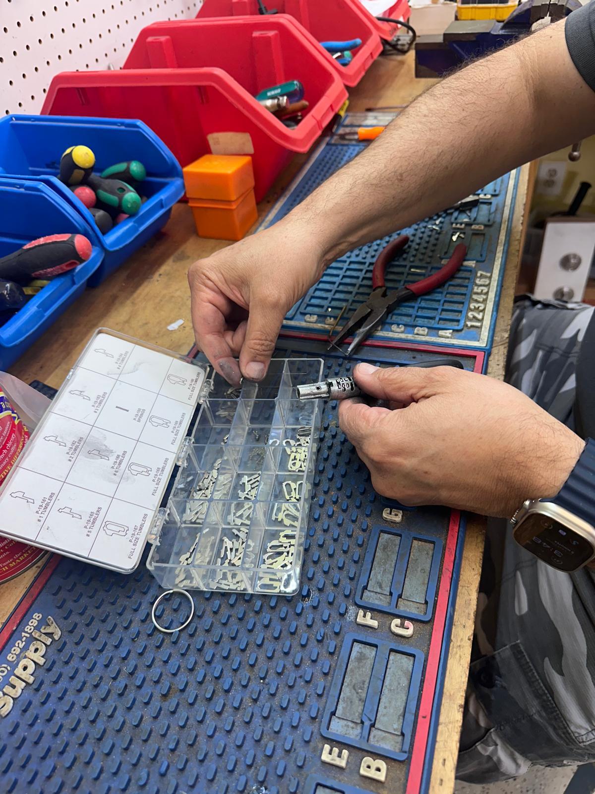 Okey Locksmith technician selecting replacement wafers for Honda ignition repair in Oklahoma City